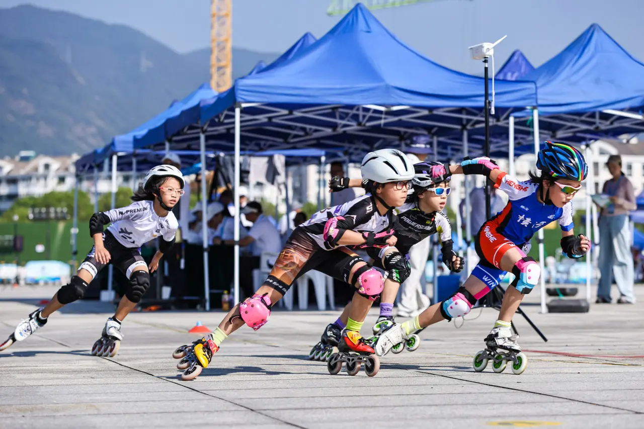 驰电掣的轮, 届体育大会